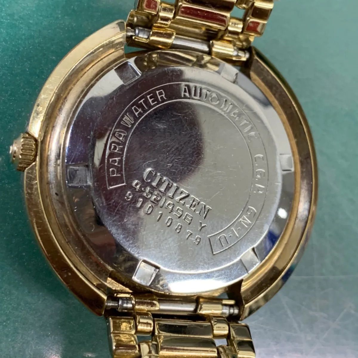 Citizen CRYSTAL SEVEN CUSTOM 6-251684 automatic wristwatch with gold dial showing time and date