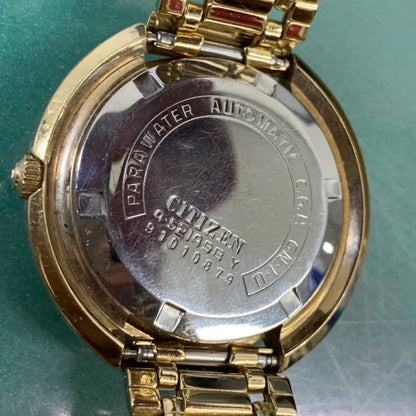Citizen CRYSTAL SEVEN CUSTOM 6-251684 automatic wristwatch with gold dial showing time and date