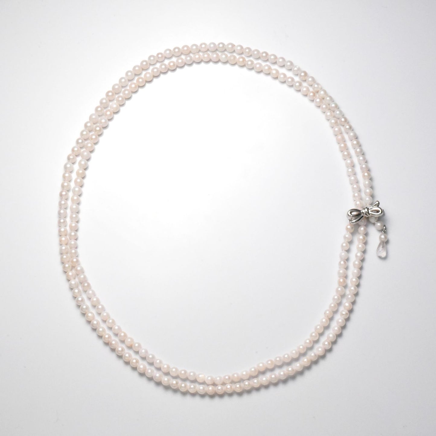Akoya cultured pearl necklace 3.5-4mm with briolette rose quartz and ribbon clasp on an 80 cm strand