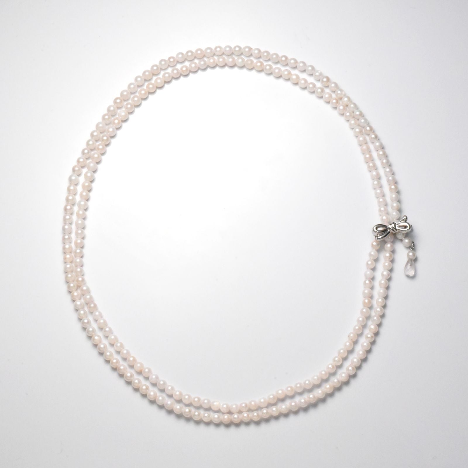 Akoya cultured pearl necklace 3.5-4mm with briolette rose quartz and ribbon clasp on an 80 cm strand