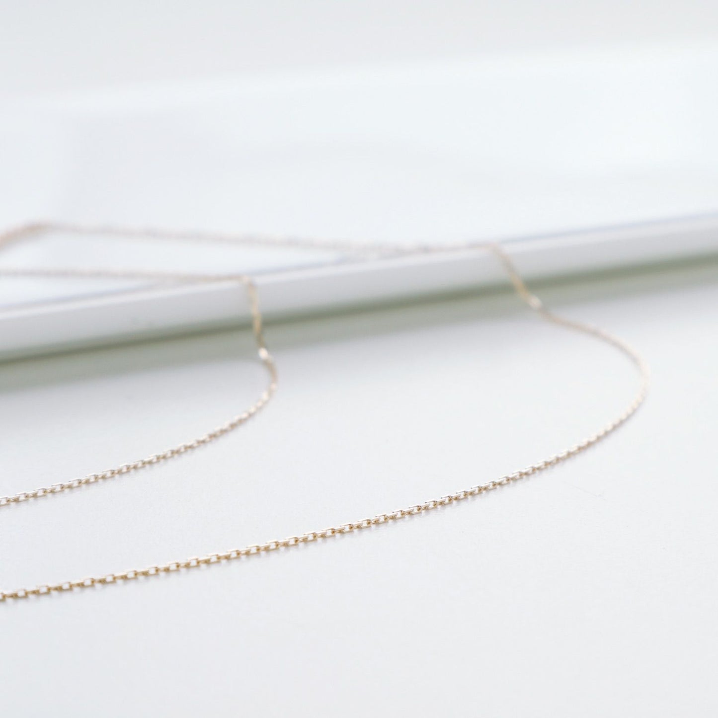 Agete K10 gold necklace featuring a 0.06ct diamond charm with 36cm chain from the early 2000s