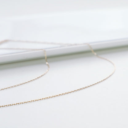 Agete K10 gold necklace featuring a 0.06ct diamond charm with 36cm chain from the early 2000s