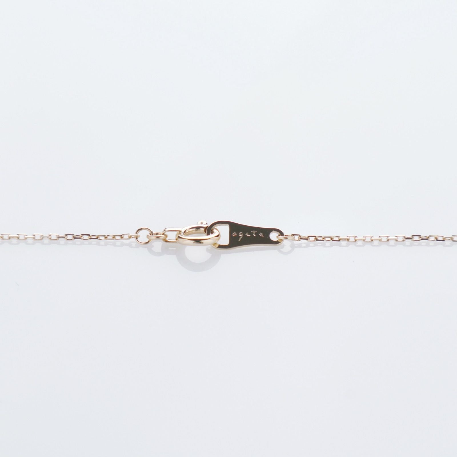 Agete K10 gold necklace featuring a 0.06ct diamond charm with 36cm chain from the early 2000s