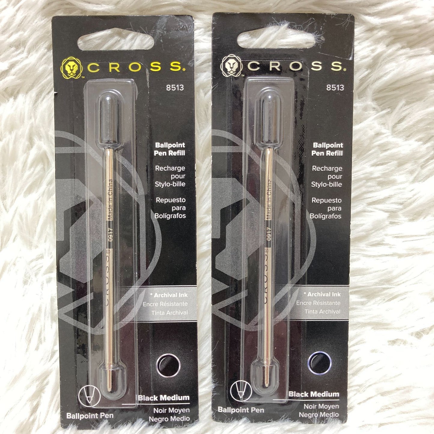 Set of seven CROSS Kuro ballpoint pen refills in black and brown with model numbers 8513 and 8514