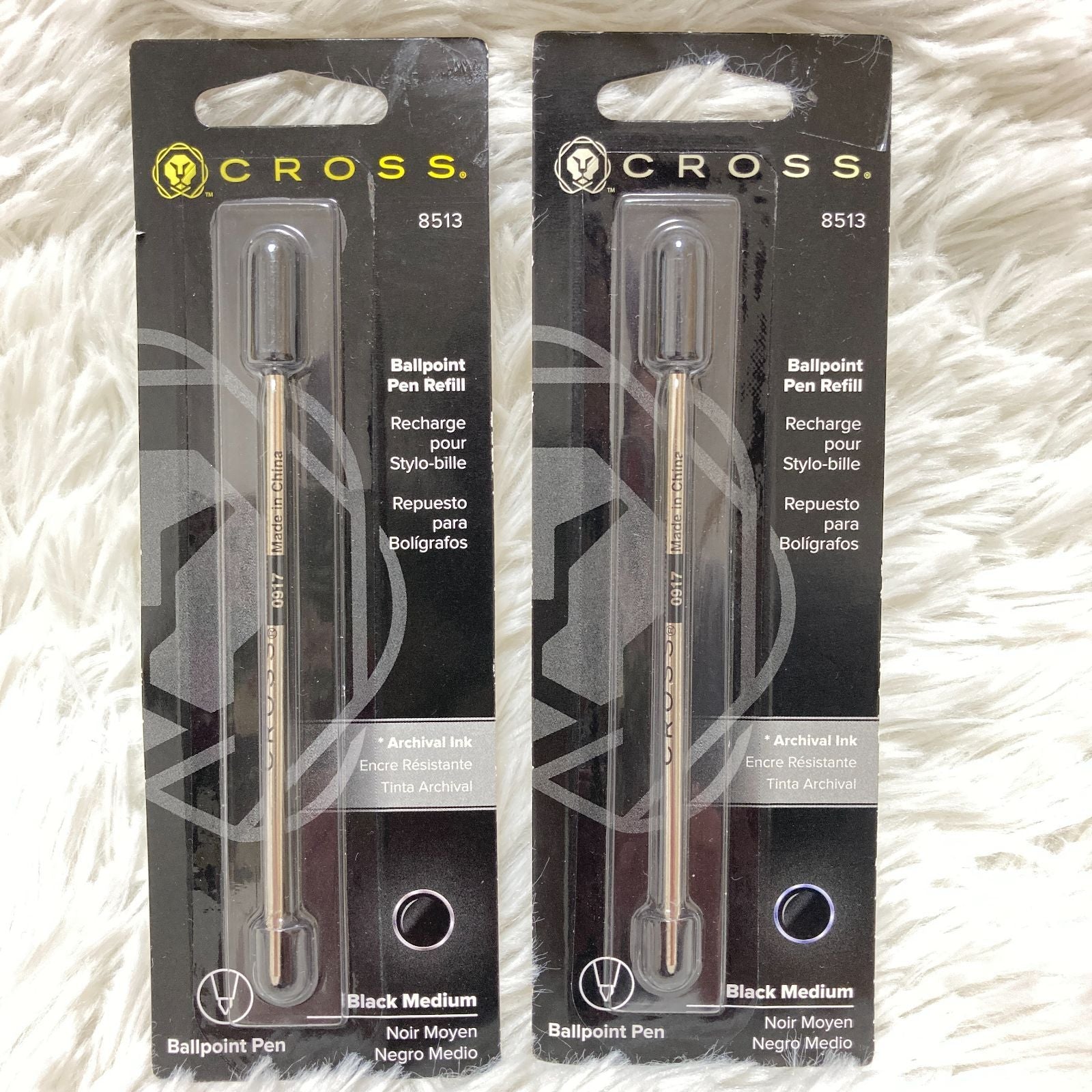 Set of seven CROSS Kuro ballpoint pen refills in black and brown with model numbers 8513 and 8514