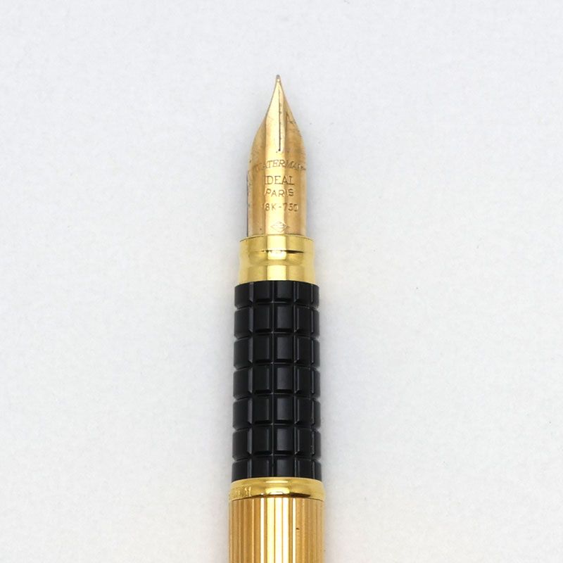 Waterman black and gold fountain pen with K18 nib, 14.2 cm length, 1.0 cm diameter
