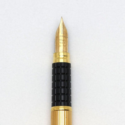 Waterman black and gold fountain pen with K18 nib, 14.2 cm length, 1.0 cm diameter