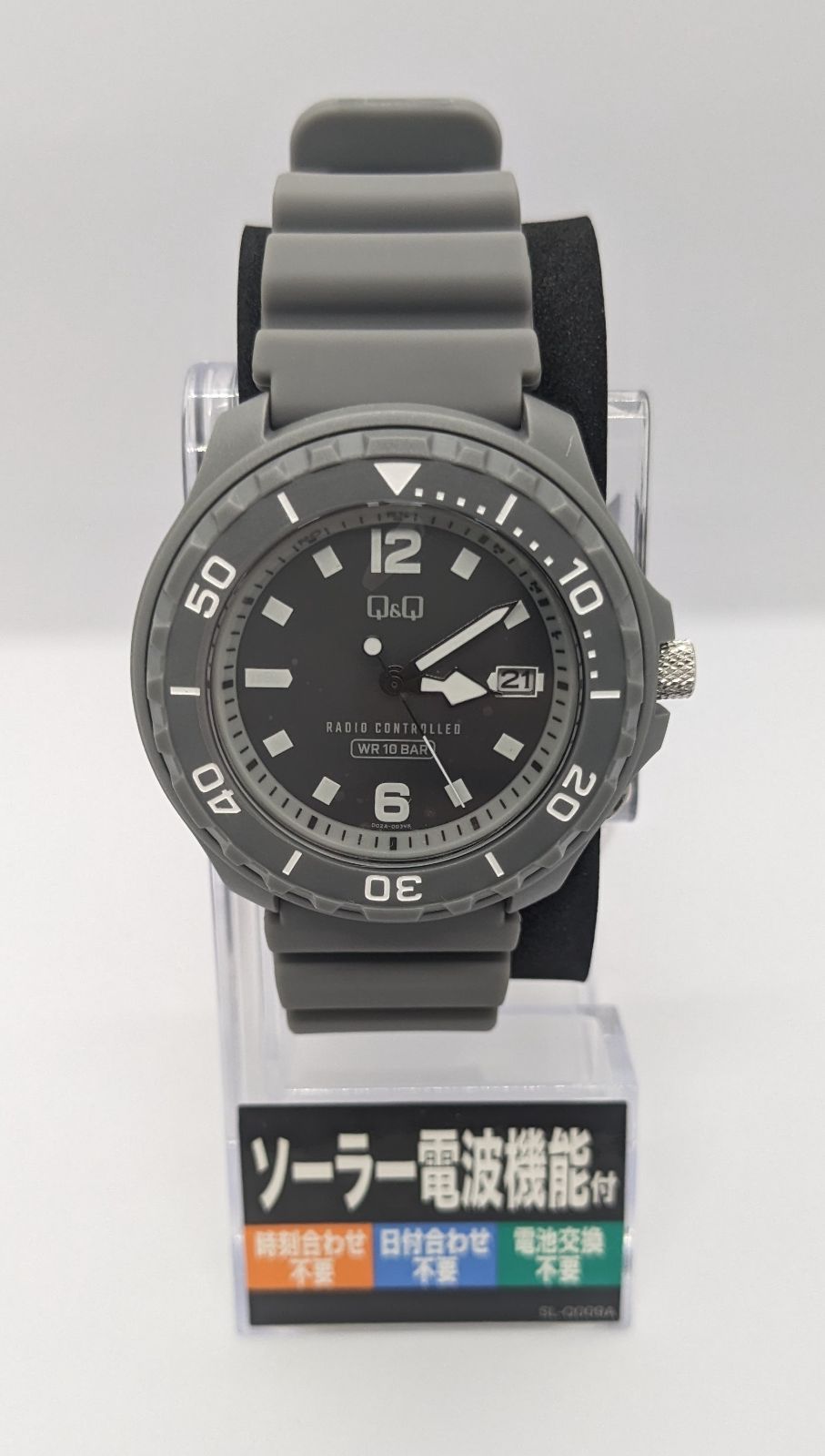 Citizen Q&Q gray analog solar radio wave wristwatch with urethane band and 10 bar water resistance