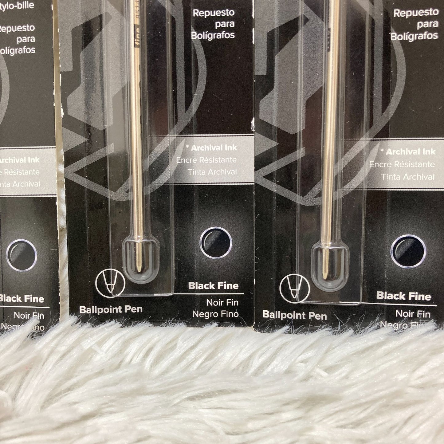 Set of seven CROSS Kuro ballpoint pen refills in black and brown with model numbers 8513 and 8514
