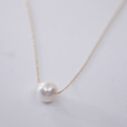 Yamato Akoya pearl necklace with 7mm single pearl on 18K yellow gold chain length 40cm