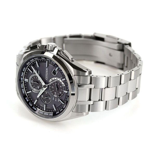 Citizen Attesa AT8040-57E watch with black dial and silver titanium band on a white background
