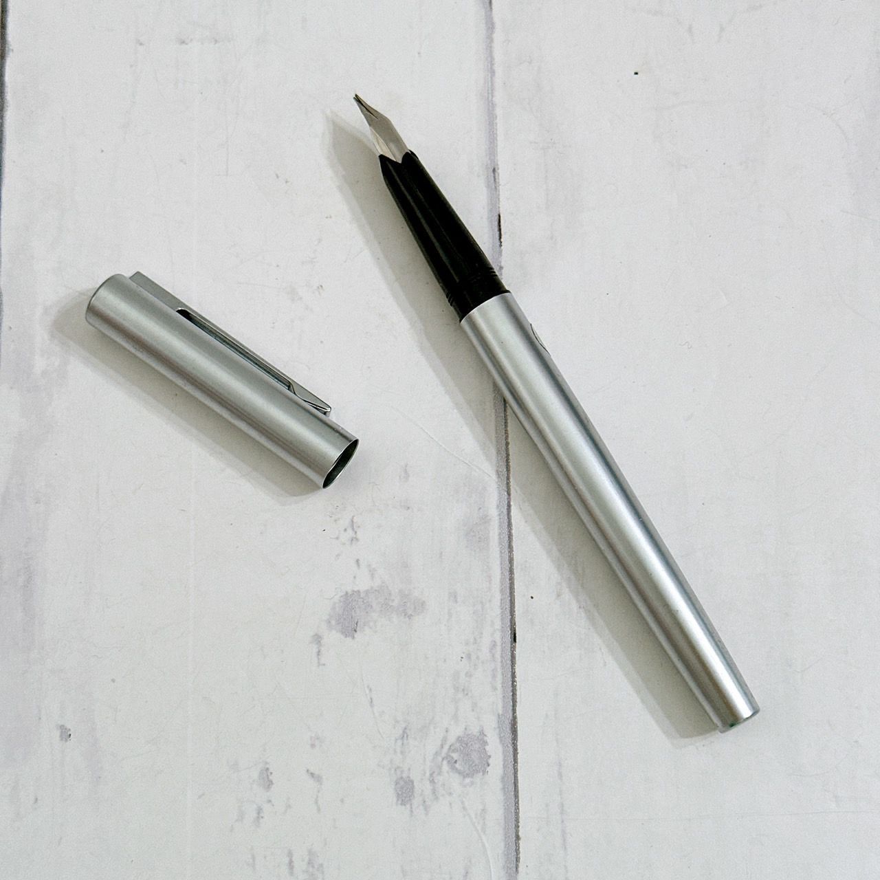 Waterman EF fountain pen with sleek black body and silver trim shown on white background