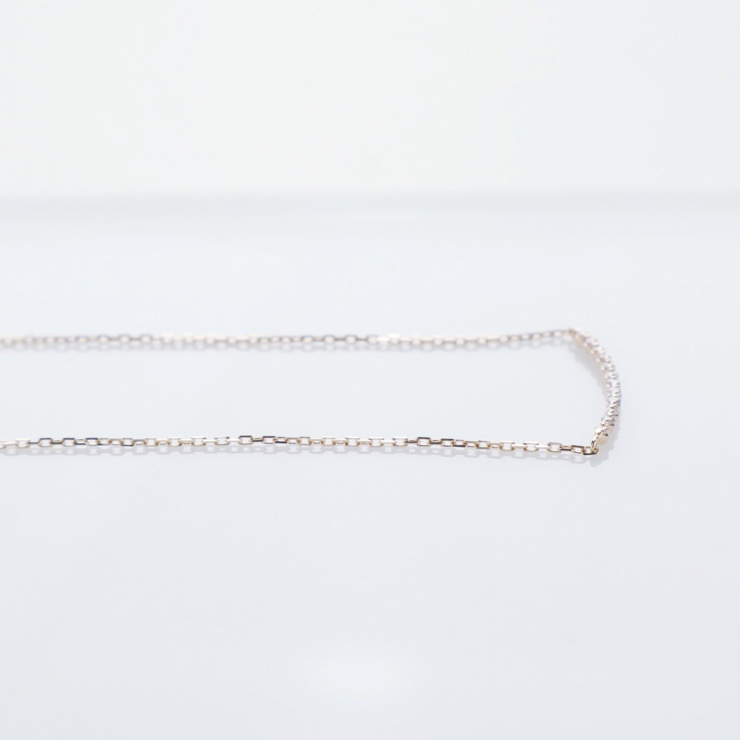 Agete K10 gold necklace featuring a 0.06ct diamond charm with 36cm chain from the early 2000s
