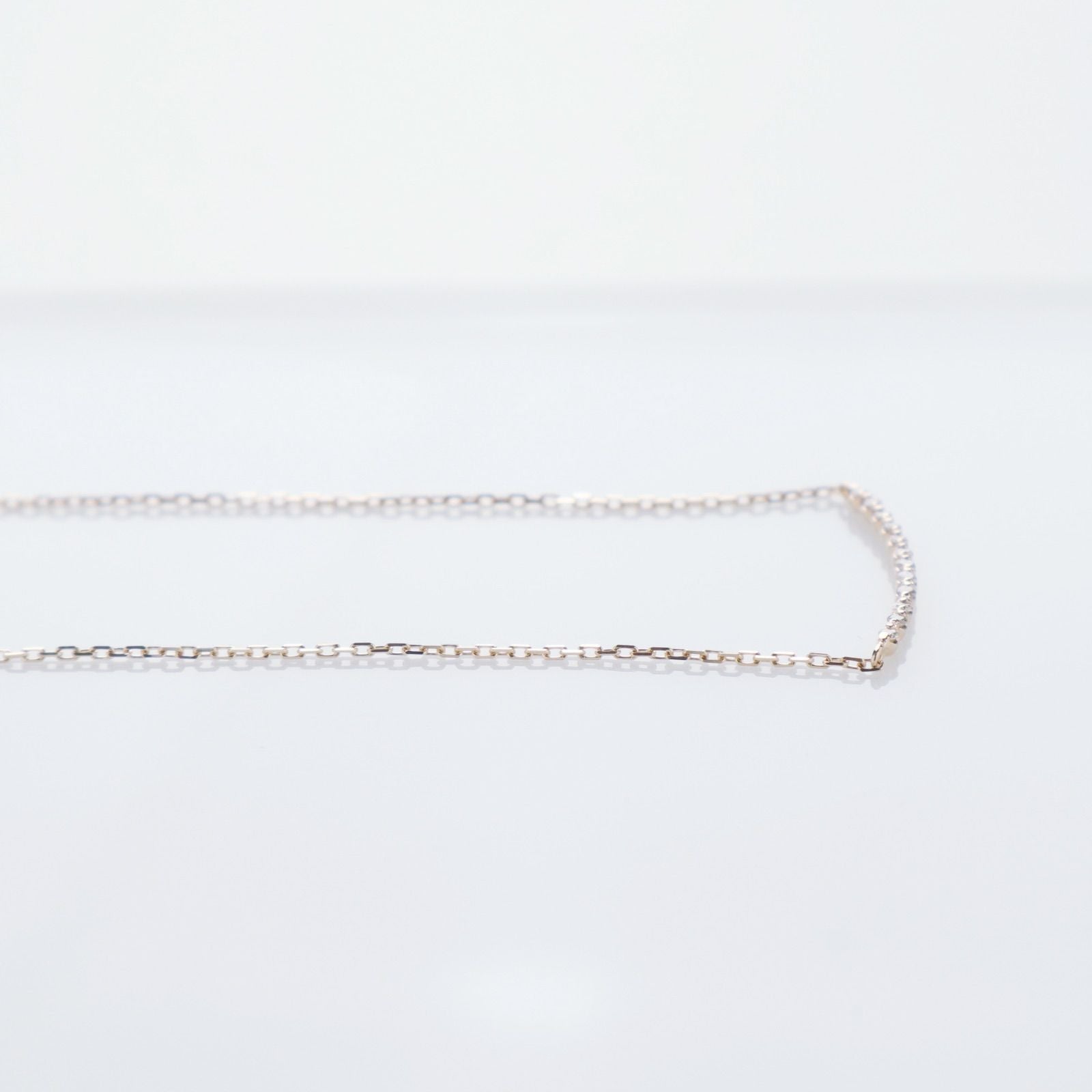 Agete K10 gold necklace featuring a 0.06ct diamond charm with 36cm chain from the early 2000s