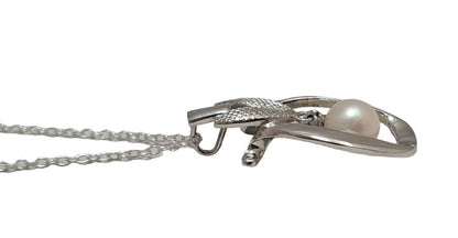 Mikimoto pearl pendant head with 6.5mm pearl on SV925 silver setting measuring 1.5x3 cm displayed on white background