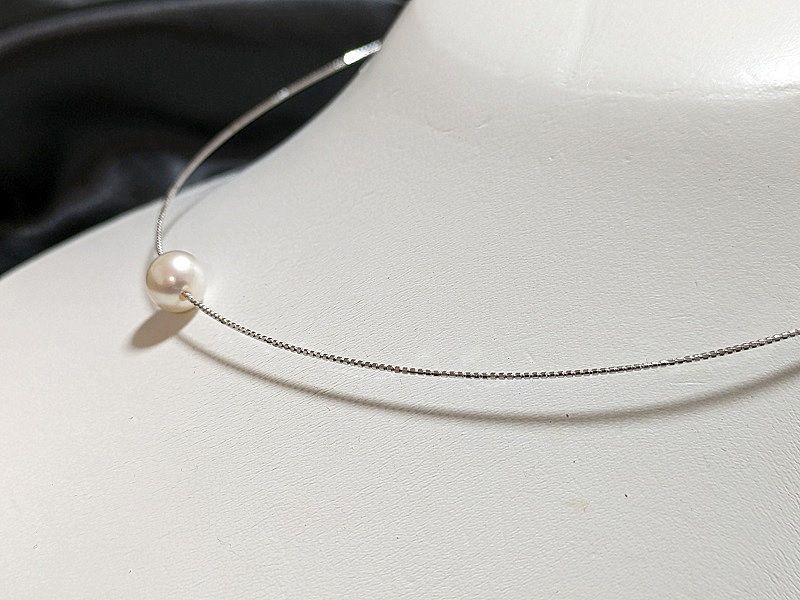 Akoya pearl Omega thread necklace with 9.5mm-9mm white slight pink round pearls and thick wrap