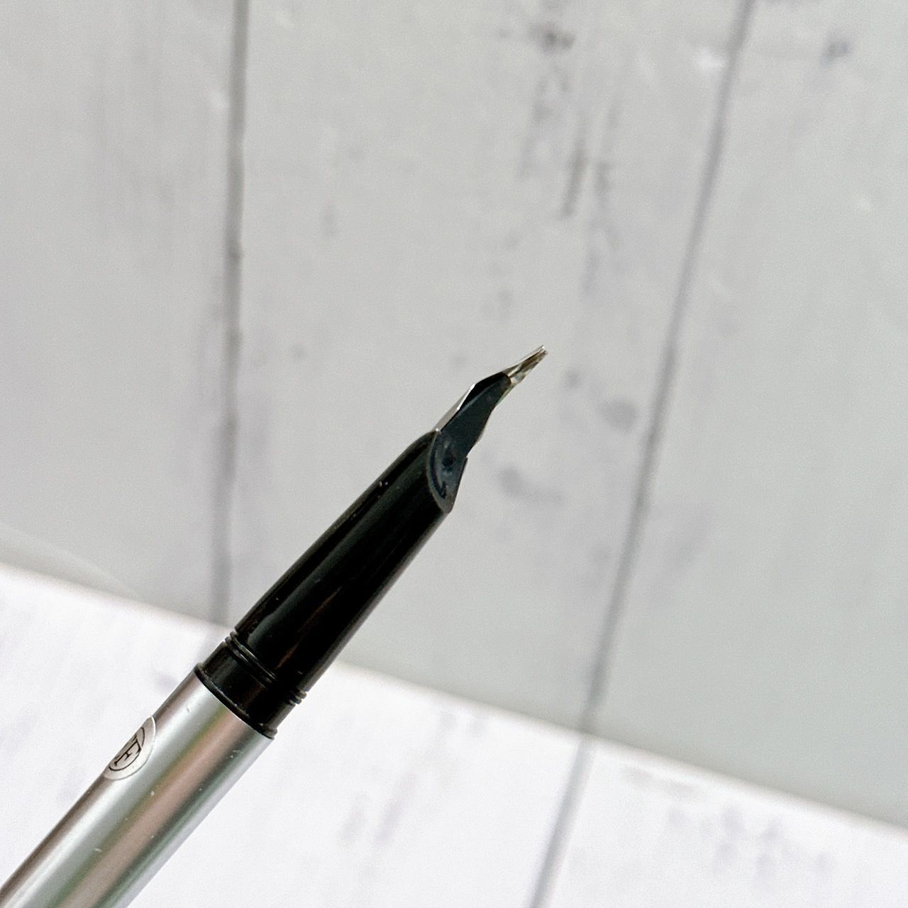Waterman EF fountain pen with sleek black body and silver trim shown on white background