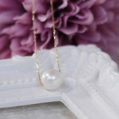 Yamato Akoya pearl necklace with 7mm single pearl on 18K yellow gold chain length 40cm