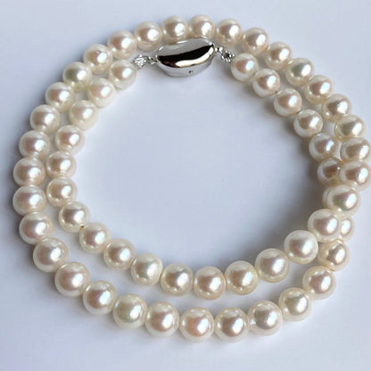 Akoya pearl necklace 43cm with 6.5-7.0mm semi-round white pearls on silver chain