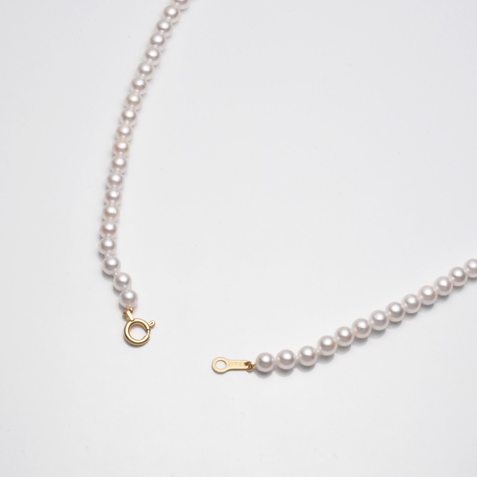 K18 yellow gold Akoya cultured pearl necklace 3.5-4mm with clasp plate on 40cm HDPE cord