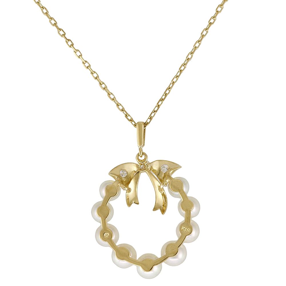 Mikimoto 18K yellow gold necklace featuring a single Akoya pearl and diamond accents for ladies