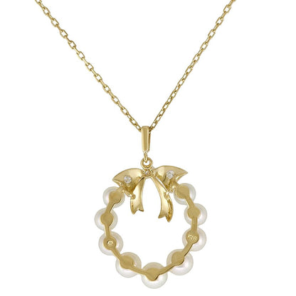 Mikimoto 18K yellow gold necklace featuring a single Akoya pearl and diamond accents for ladies