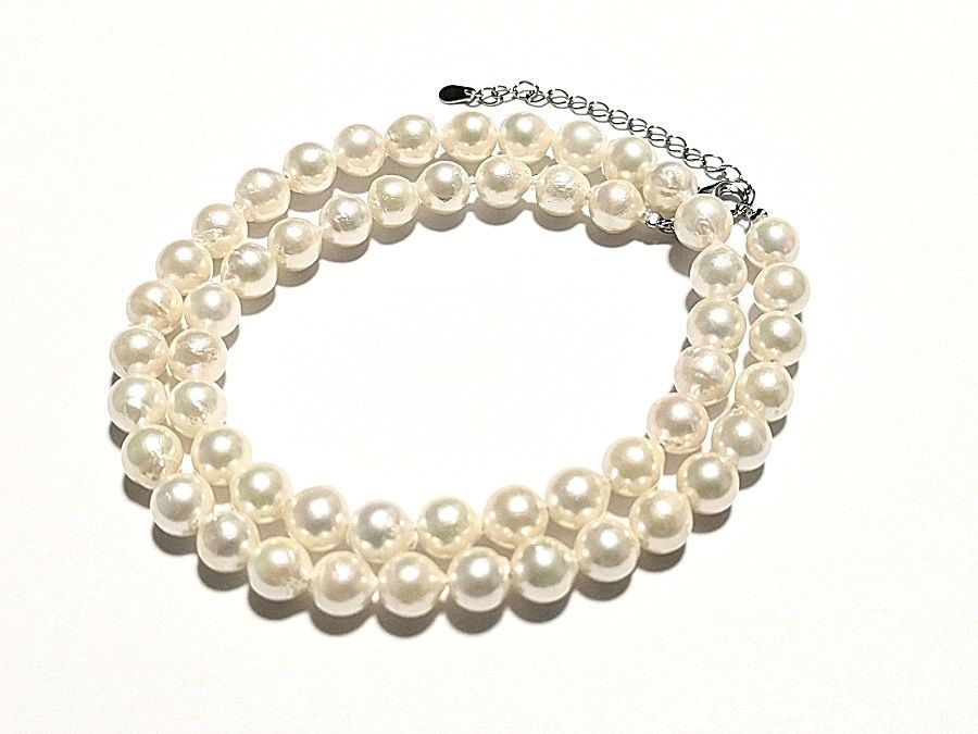 Akoya pearl necklace with 7.0mm-7.5mm white round to semi-round pearls and stainless steel push clasp