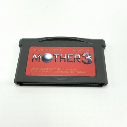 Nintendo Game Boy Advance MOTHER3 game cartridge and manual in Japanese with worn case