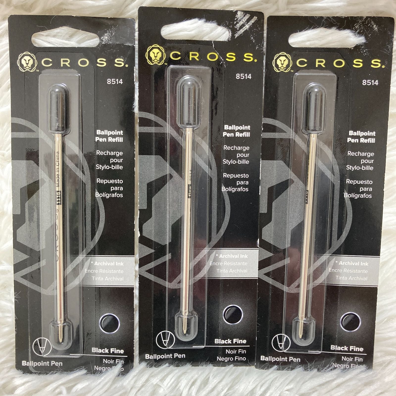 Set of seven CROSS Kuro ballpoint pen refills in black and brown with model numbers 8513 and 8514