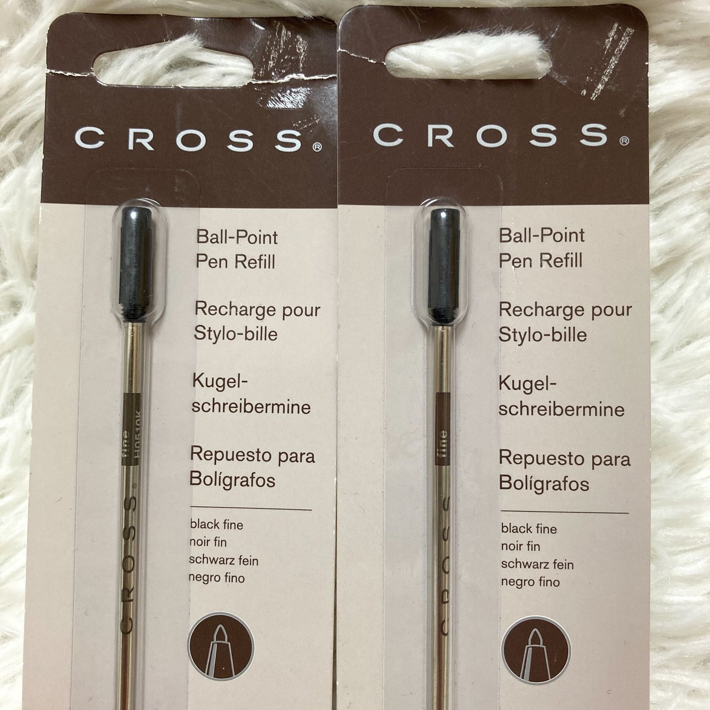Set of seven CROSS Kuro ballpoint pen refills in black and brown with model numbers 8513 and 8514