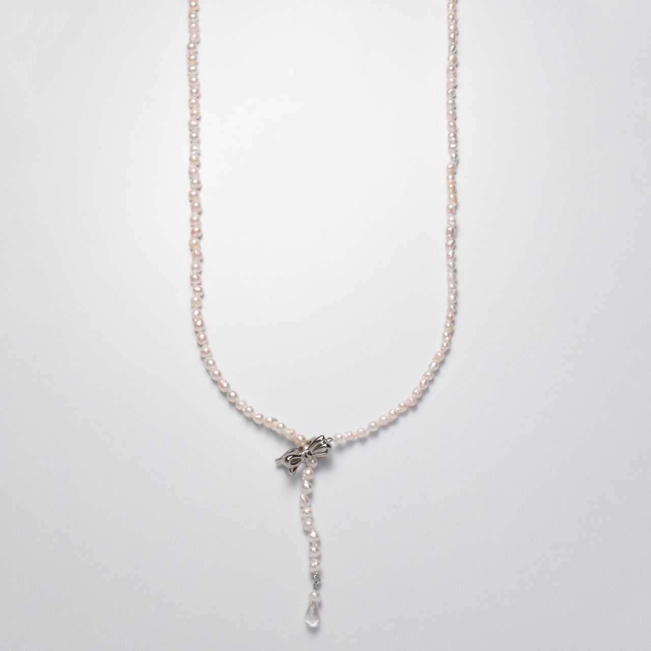 Baroque shape Akoya pearl necklace with 3-3.5mm pearls and rose quartz ribbon clasp, 80cm long