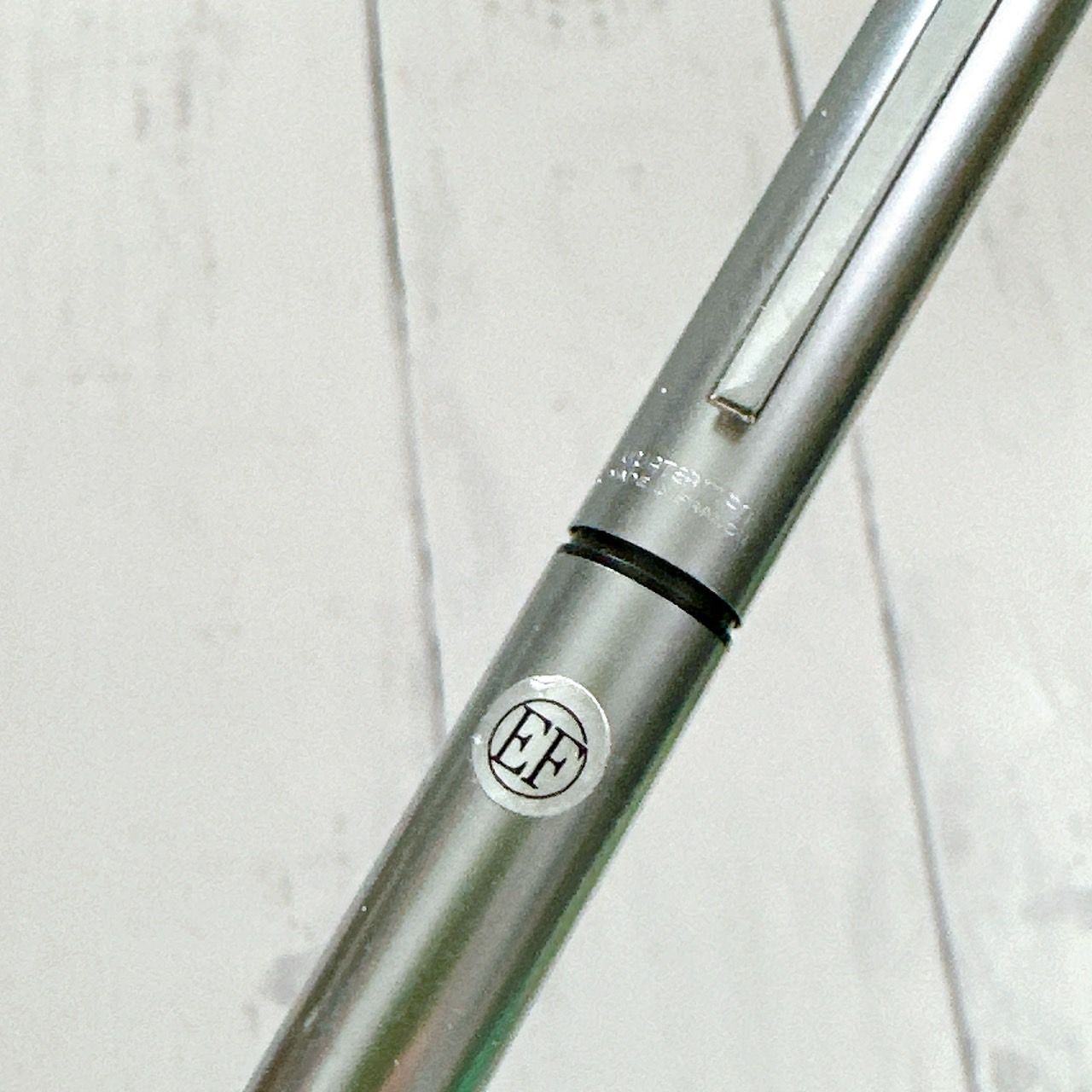 Waterman EF fountain pen with sleek black body and silver trim shown on white background