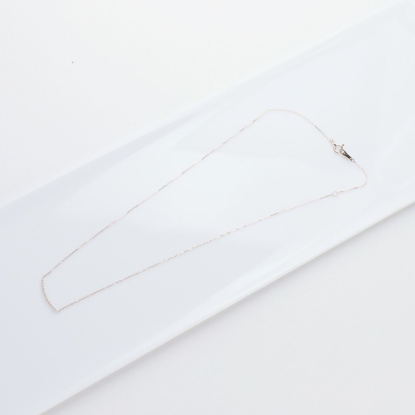 Agete K10 gold necklace featuring a 0.06ct diamond charm with 36cm chain from the early 2000s
