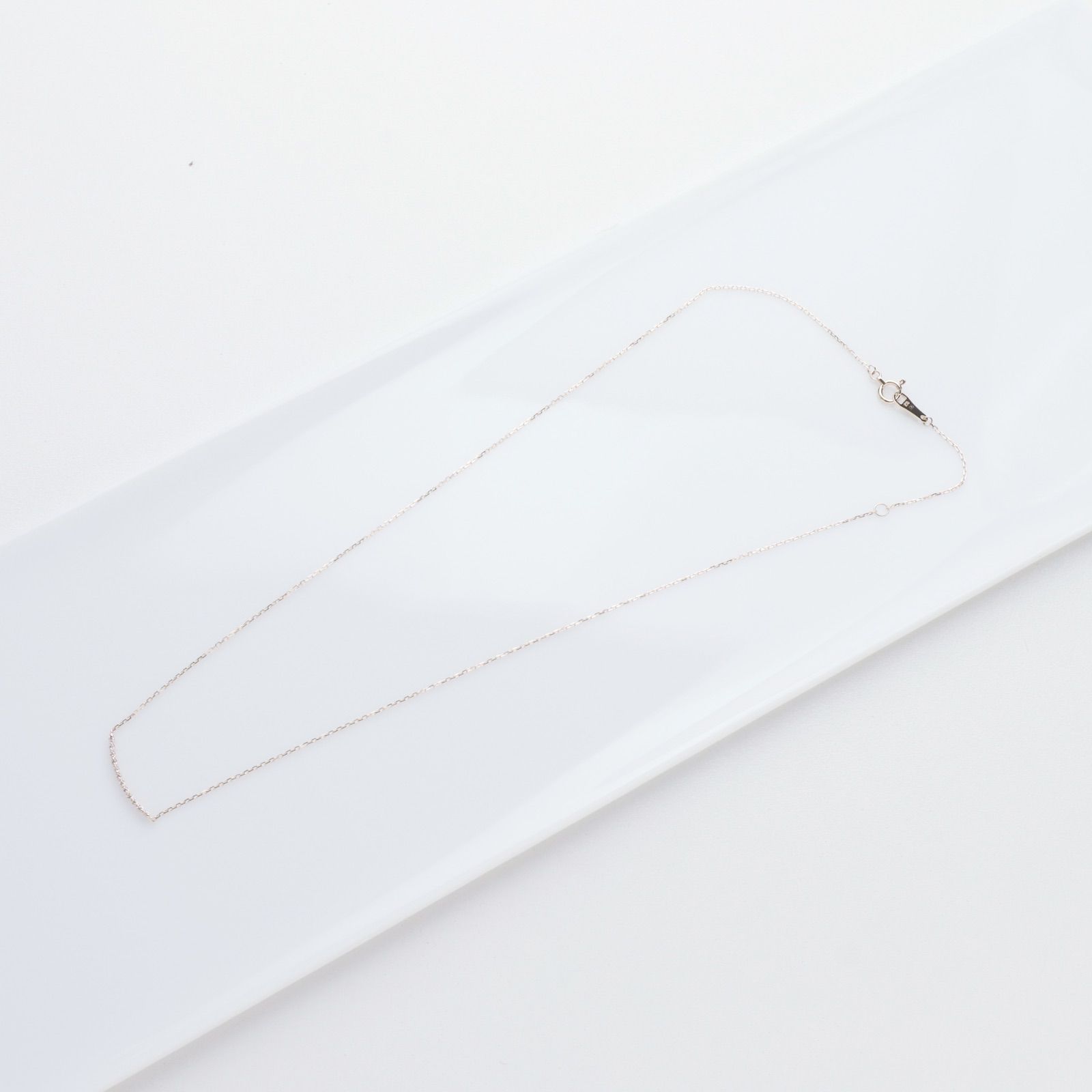 Agete K10 gold necklace featuring a 0.06ct diamond charm with 36cm chain from the early 2000s