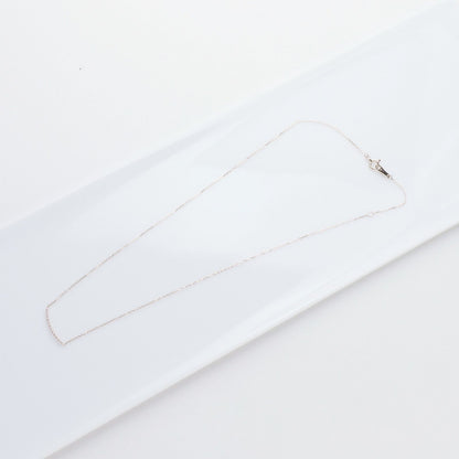 Agete K10 gold necklace featuring a 0.06ct diamond charm with 36cm chain from the early 2000s