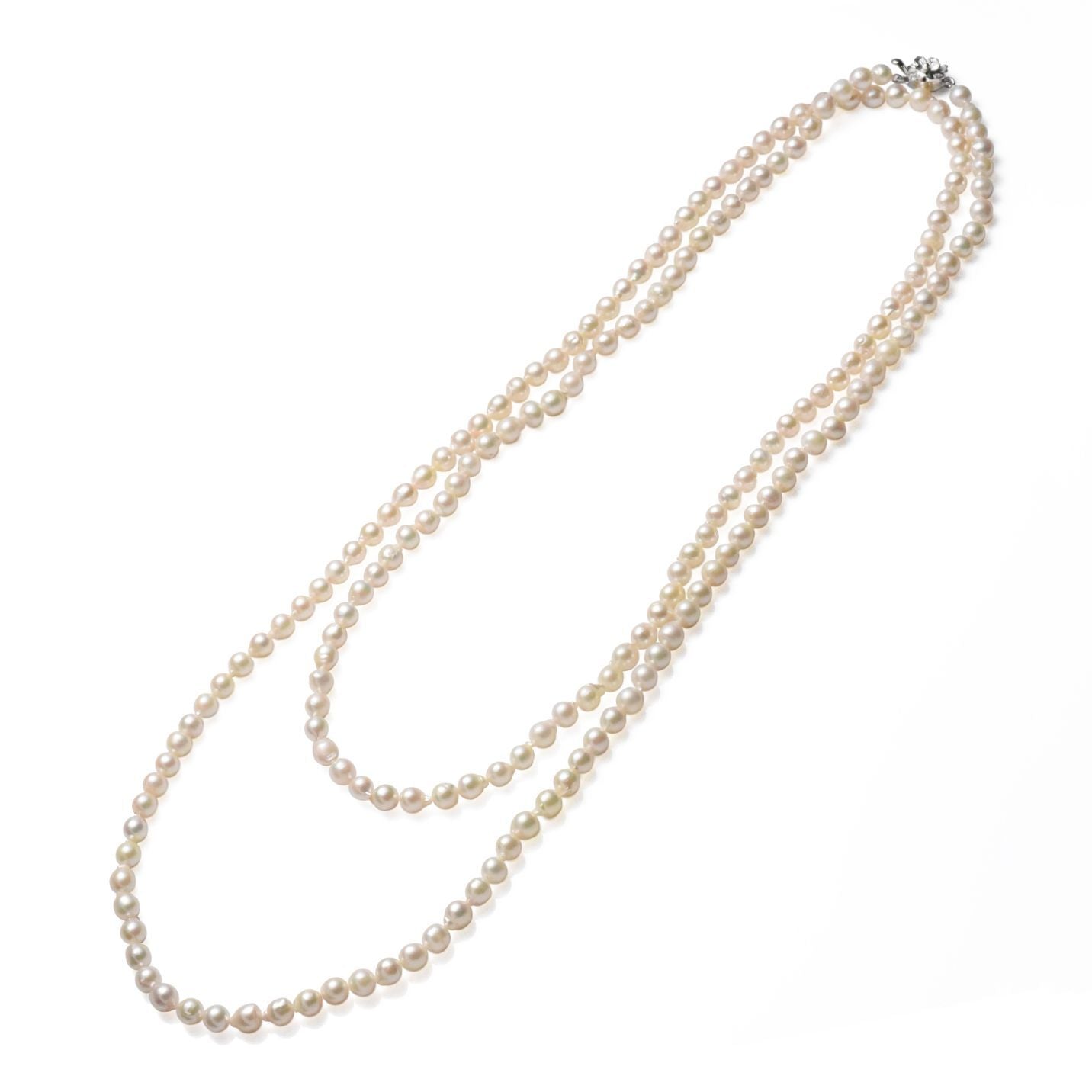 Akoya cultured pearl 5.5-6mm baroque shape long 120cm necklace with silver clasp on white background