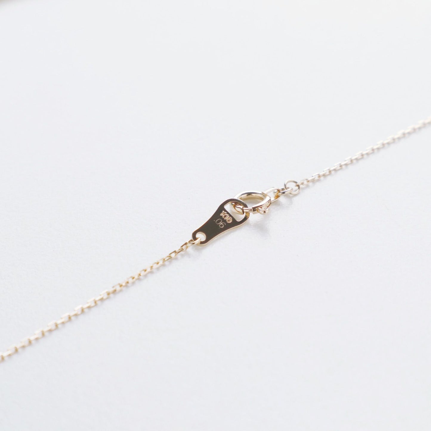Agete K10 gold necklace featuring a 0.06ct diamond charm with 36cm chain from the early 2000s