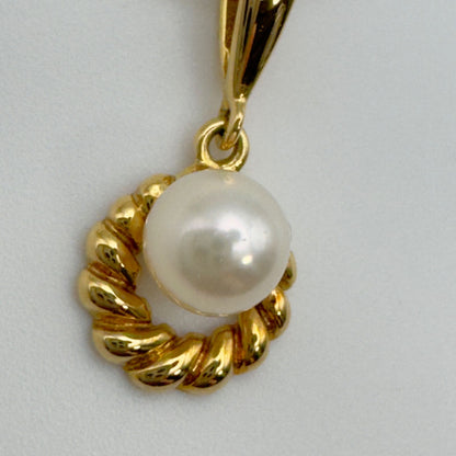 Mikimoto Necklace Top featuring a 4.9mm pearl set in a K18 gold setting weighing 0.9 grams