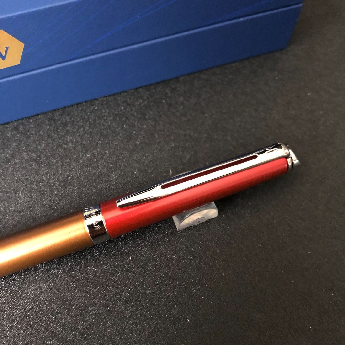 WATERMAN Metropolitan Essential Sunset Orange ballpoint pen with stainless steel lacquer finish and palladium plated trims