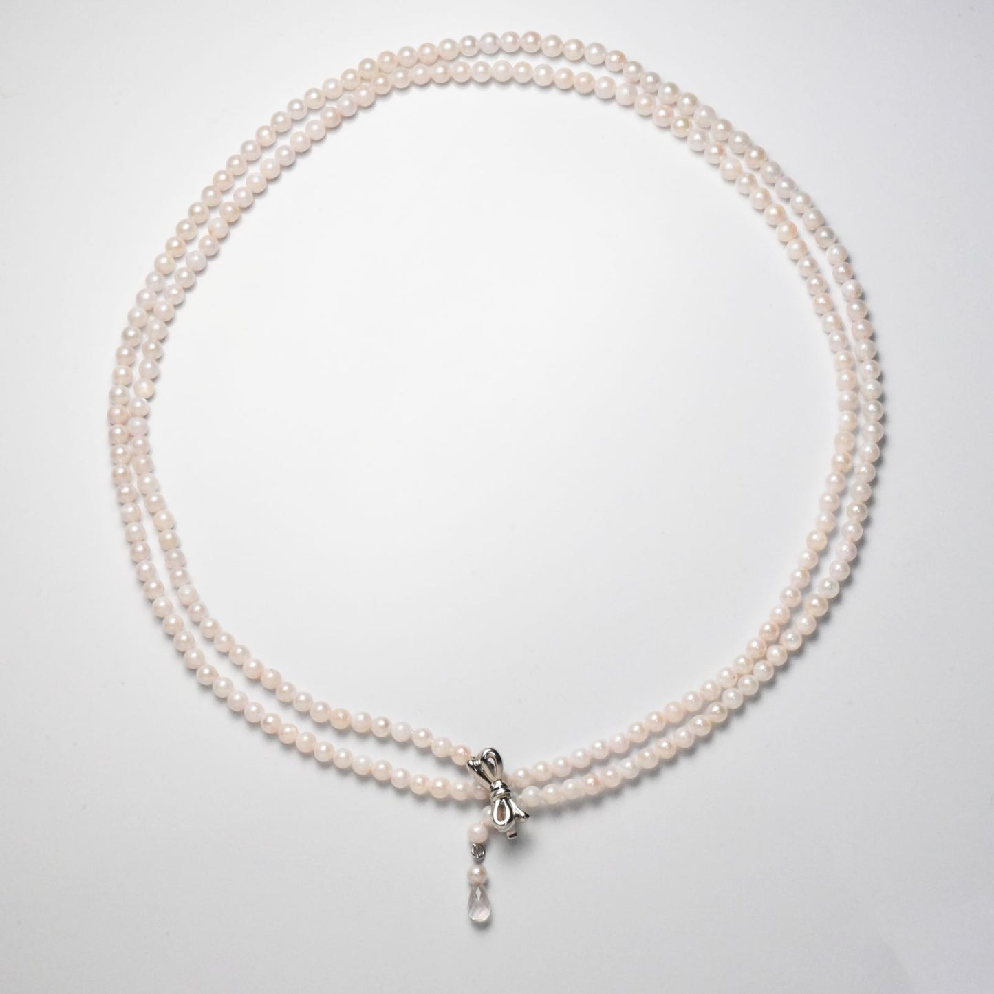 Akoya cultured pearl necklace 3.5-4mm with briolette rose quartz and ribbon clasp on an 80 cm strand