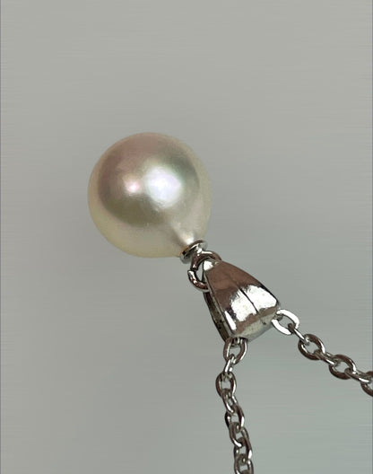 Akoya pearl necklace with a single 8.5mm white pearl on a silver chain