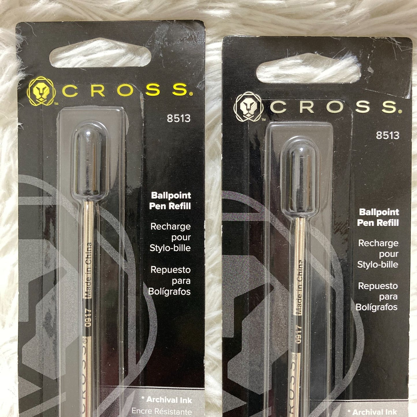 Set of seven CROSS Kuro ballpoint pen refills in black and brown with model numbers 8513 and 8514