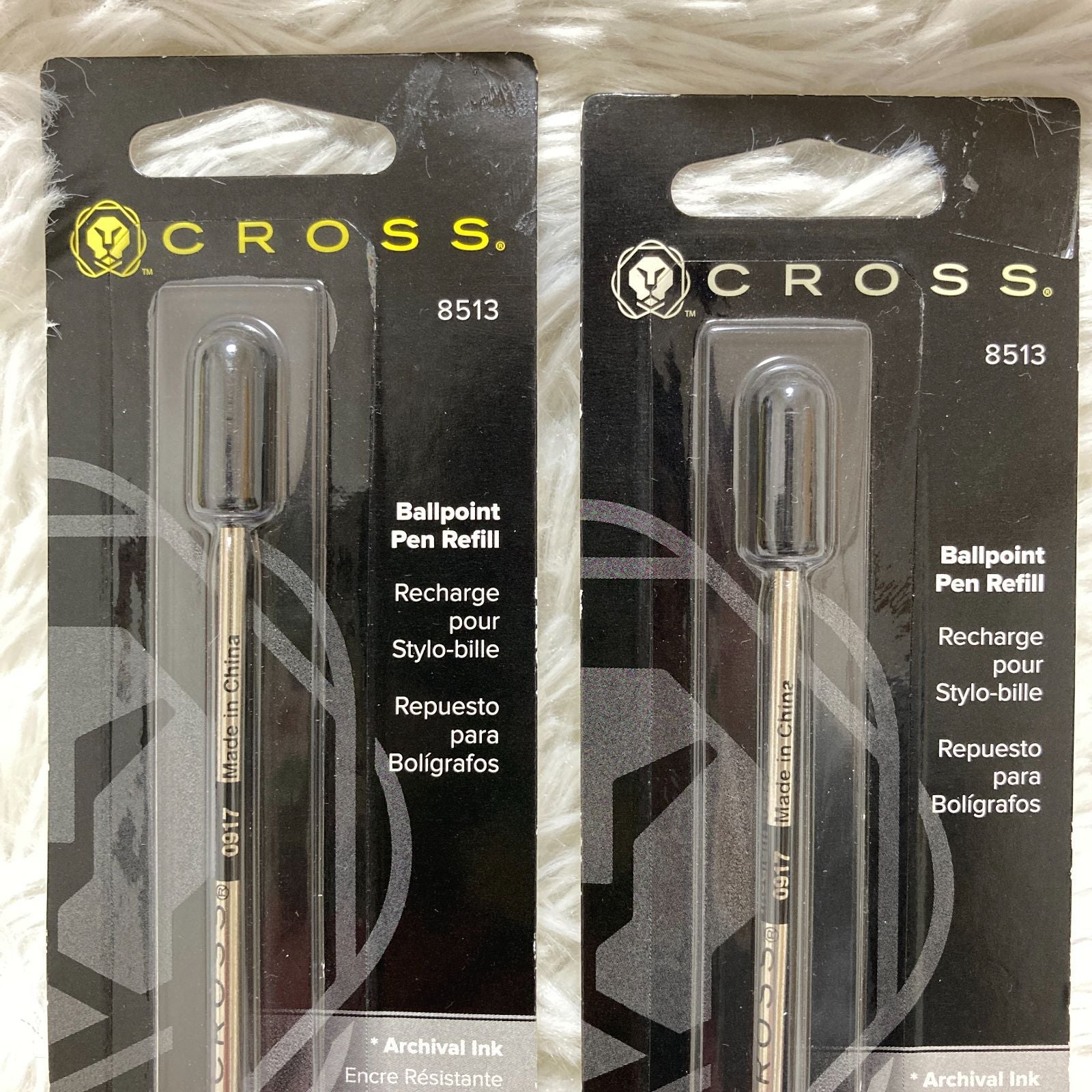Set of seven CROSS Kuro ballpoint pen refills in black and brown with model numbers 8513 and 8514