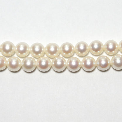 Tasaki Akoya pearl long necklace with 6.5-6.8mm pearls and silver clasp measuring 122cm