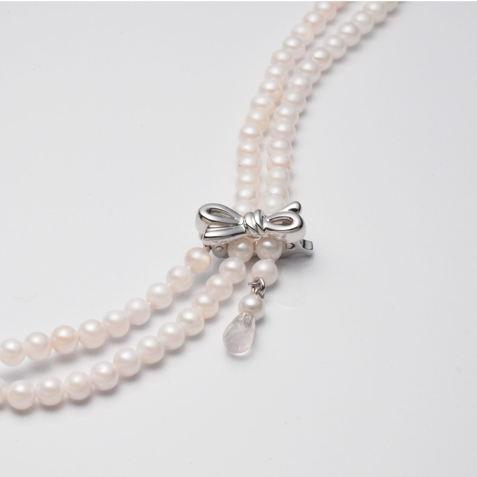 Akoya cultured pearl necklace 3.5-4mm with briolette rose quartz and ribbon clasp on an 80 cm strand