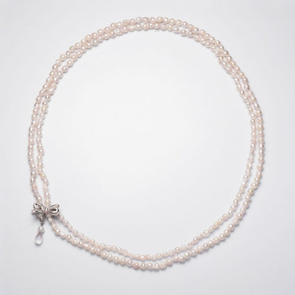 Baroque shape Akoya pearl necklace with 3-3.5mm pearls and rose quartz ribbon clasp, 80cm long