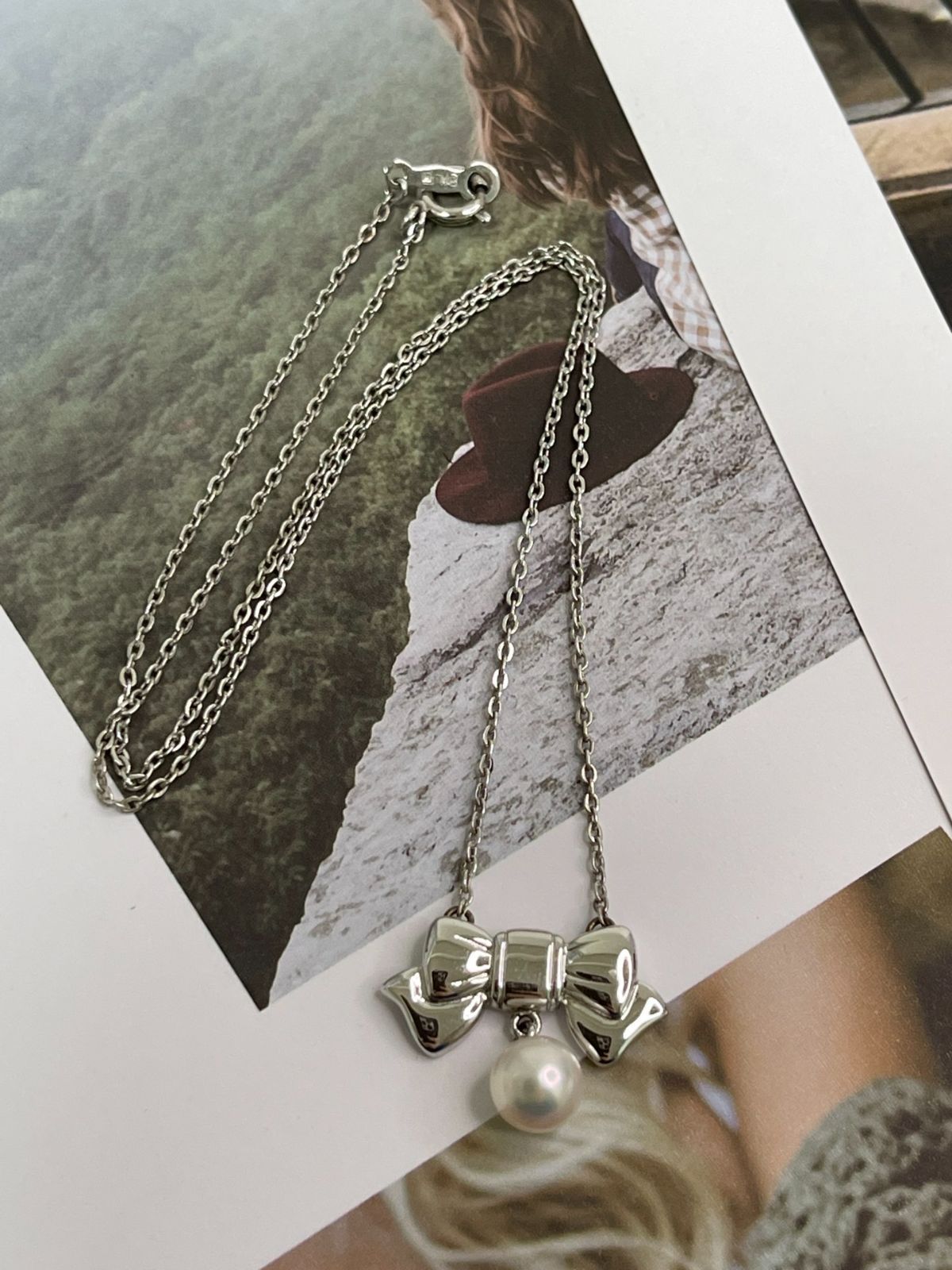 Mikimoto silver necklace with 6.5mm pearls weighing 3.5g, 38cm length