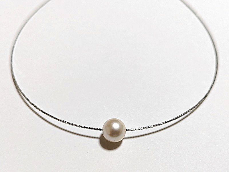 Akoya pearl Omega thread necklace with 9.5mm-9mm white slight pink round pearls and thick wrap