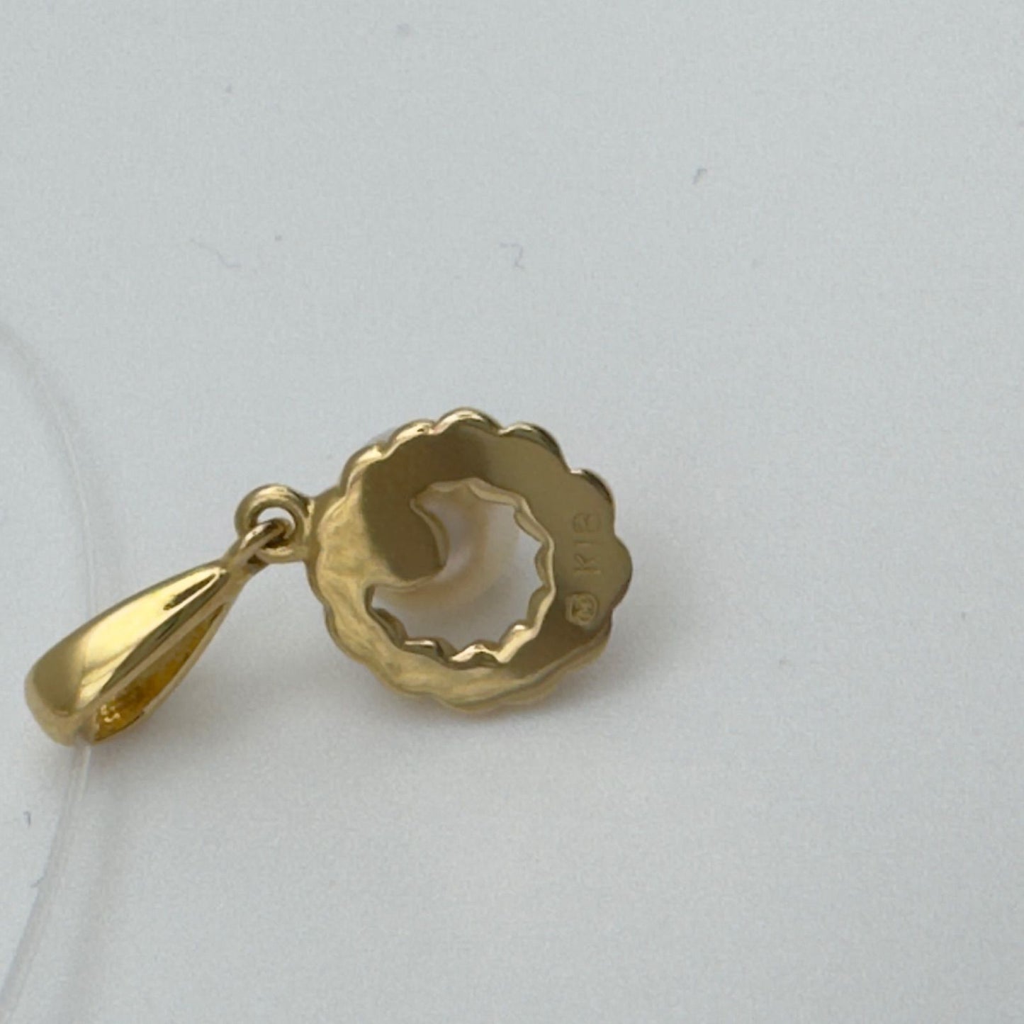 Mikimoto Necklace Top featuring a 4.9mm pearl set in a K18 gold setting weighing 0.9 grams