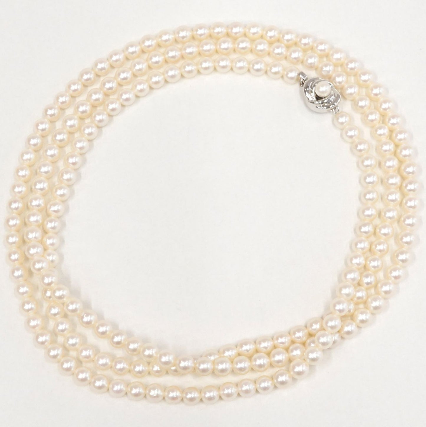 Tasaki Akoya pearl long necklace with 6.5-6.8mm pearls and silver clasp measuring 122cm
